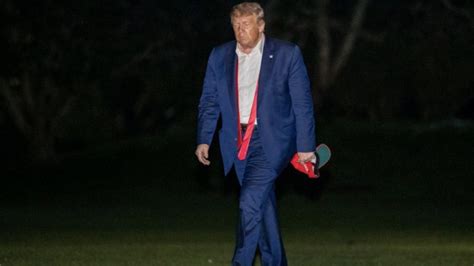 Trump returns from Tulsa rally with tie undone and MAGA hat in hand [Video]