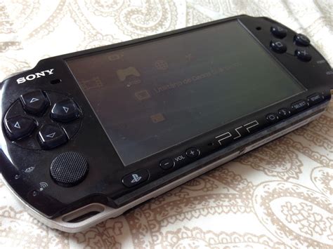 Psp Slim 3000 8 Gigas Destravado 100 Jogos Na Caixa - R$ 400,00 em ...