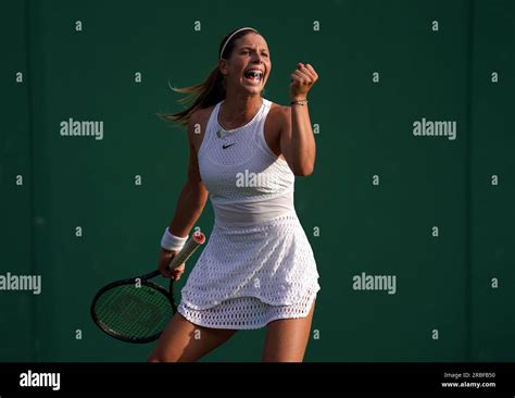 Hannah Klugman celebrates during her Girls singles match on day seven of the 2023 Wimbledon ...