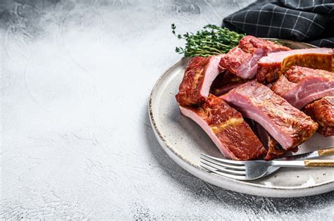 Premium Photo | Sliced bbq pork ribs in a sauce