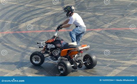 Yekaterinburg, Russia-August, 2019: Man on Quad Bike Stunts at Festival. Action Editorial Stock ...