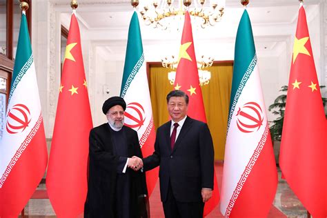 China, Iran call for Iran sanctions to be lifted; Xi to visit | Reuters