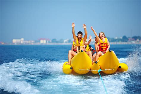 Myrtle Beach Boat Tours - Friends riding the banana boat - Coral Beach