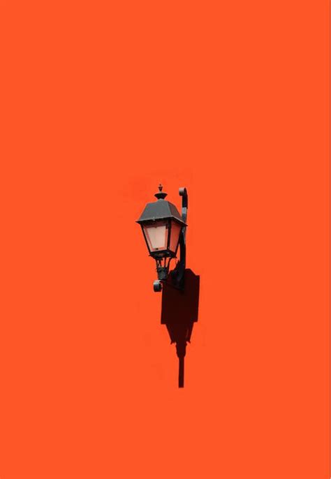 Streetlight on an Orange Wall · Free Stock Photo