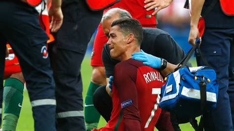 Cristiano Ronaldo stretchered off in tears in Euro 2016 final ...