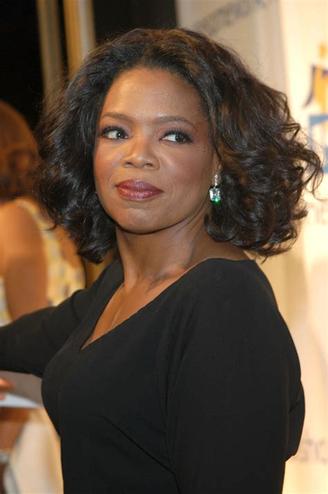 A Look Back At Oprah Winfrey's Legendary Hair Journey | Essence | Oprah, Oprah winfrey, Teased hair