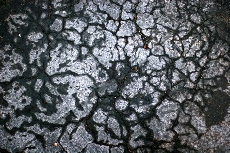 Cracked Asphalt Texture | Closeup of cracked asphalt surface… | Flickr