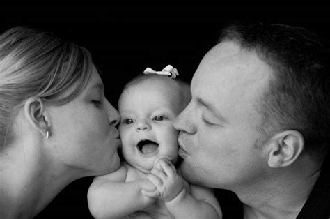 Parents kiss Baby Girl Wallpapers HD / Desktop and Mobile Backgrounds