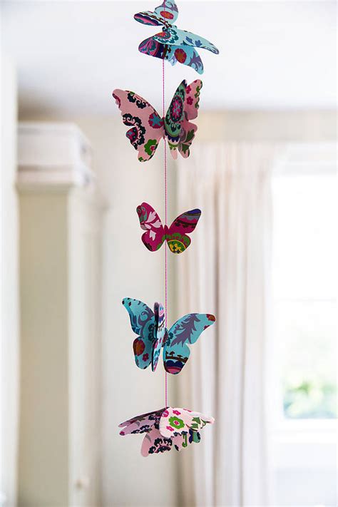 cut out pink paper butterfly garland by anusha | notonthehighstreet.com