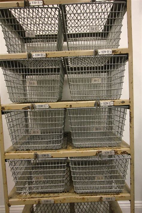 Need something like this, large wire baskets set up for shoes in the ...