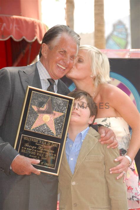 George Hamilton with Kimberly Blackford and their son George-Thomas at the ceremony honoring ...