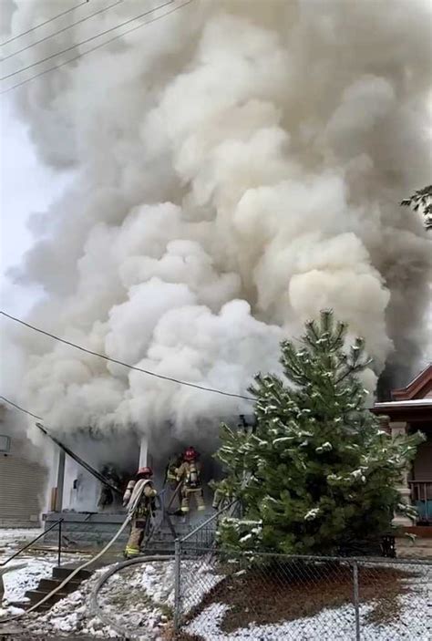 Fire crews fight vacant building blaze in California neighborhood while ...