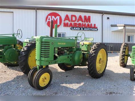 John Deere Model A tractor - Adam Marshall Land & Auction, LLC