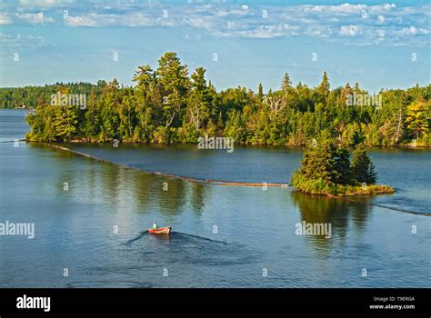 Boating on Lake of the Woods Kenora Ontario Canada Stock Photo - Alamy