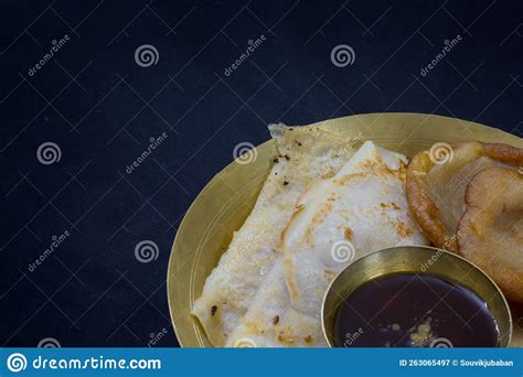 Pithe Or Rice Flour Dumplings With Coconut Fillings Being Served On A Plate With Date Palm ...