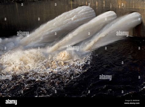 Kielder Water Reservoir Dam stilling basin with water discharging from valves Stock Photo - Alamy