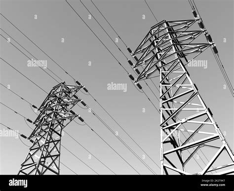 Overhead power line in black and white Stock Photo - Alamy