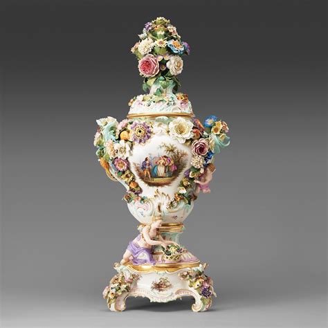 A large Meissen porcelain flower-encrusted pot-pourri vase, cover and ...