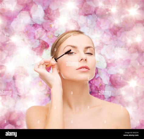 beautiful woman with mascara Stock Photo - Alamy