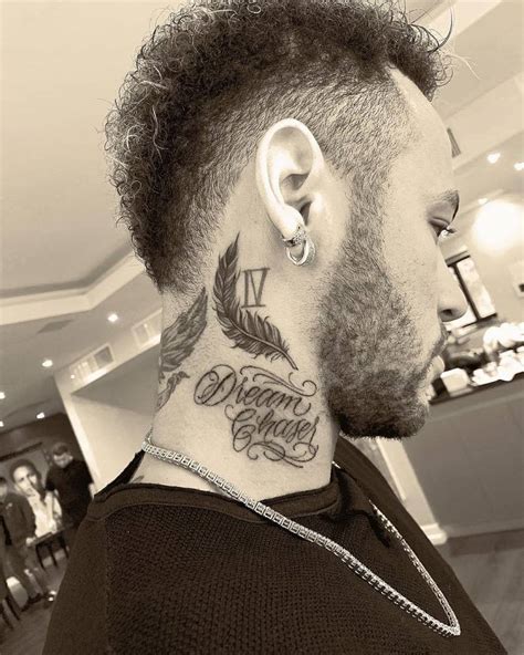 “Dream chaser” and feather tattoo on Neymar's neck.