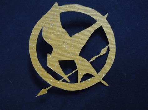 A Britt Without Boys: Mockingjay Pin