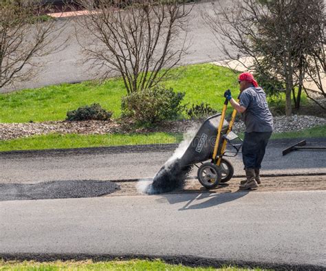 Workers Applying Extra Blacktop To Repair Asphalt Street Editorial ...