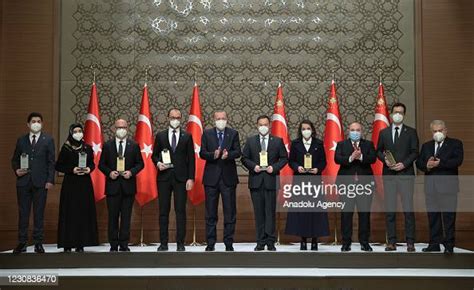 Turkish President Recep Tayyip Erdogan and owners of the awards pose ...