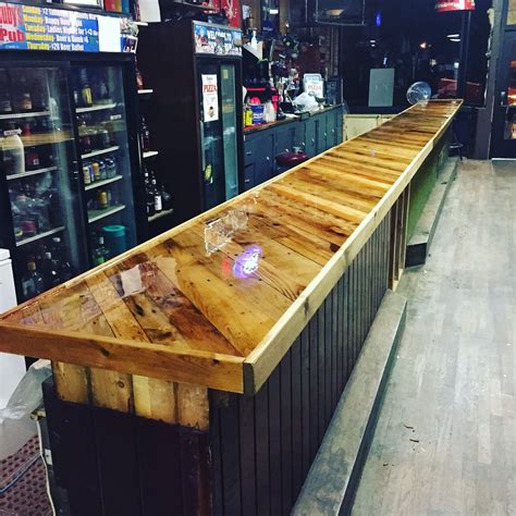 Bar top made from pallet boards and covered with epoxy Outdoor Kitchen Countertops, Outdoor ...