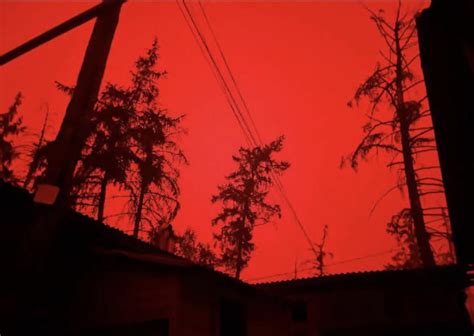 Not a photoshop, but a completely red sky in Yakutia due to smoke from massive forest fires that ...