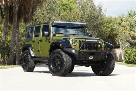 2007 JEEP WRANGLER CUSTOM UNLIMITED SAHARA - Front 3/4 - 205948