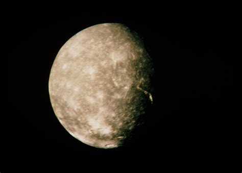 Voyager 2 Image Of Uranus's Moon Titania Photograph by Nasa/science Photo Library - Pixels