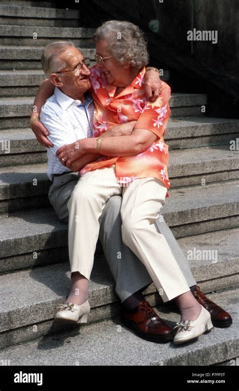 Old couple cuddling, Berlin, Germany Stock Photo - Alamy