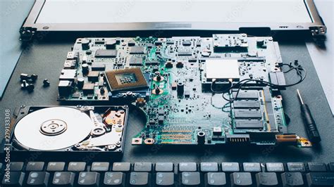 Laptop repair. Disassembled computer parts. PC electronic components ...