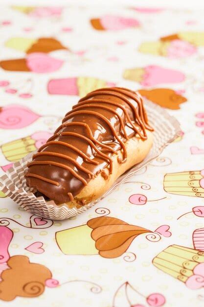 Premium Photo | Chocolate eclair with chocolate filling