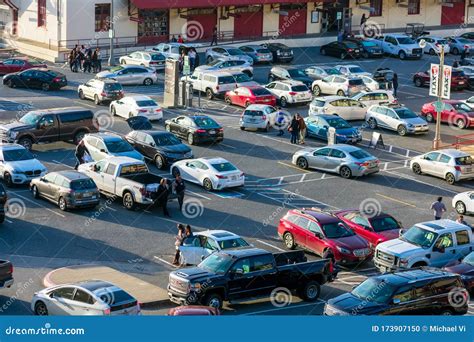 Aerial View Of Busy And Full Parking Lot With Cars Arriving And Leaving, People Waiting At Fort ...