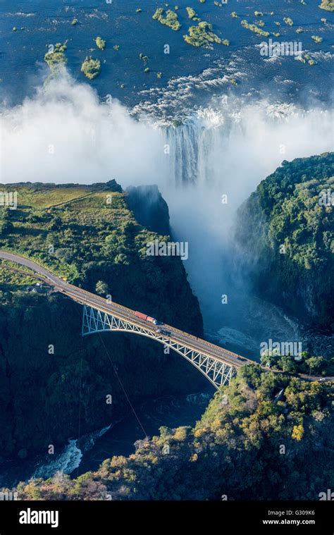 Aerial view of Victoria Falls behind bridge Stock Photo - Alamy