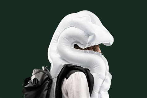 Bicycle airbag backpack blows up womb-like head and neck protection ...