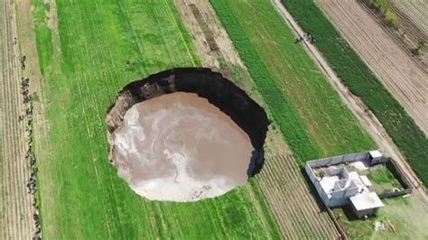 Mexico: Massive sinkhole threatens to swallow nearby house | World News ...