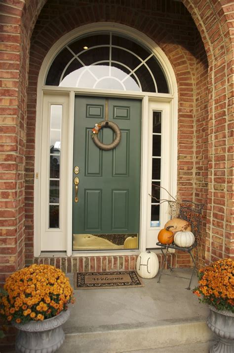 Fall on the front porch - homecrush | Brick exterior house, Brick house front door colors ...