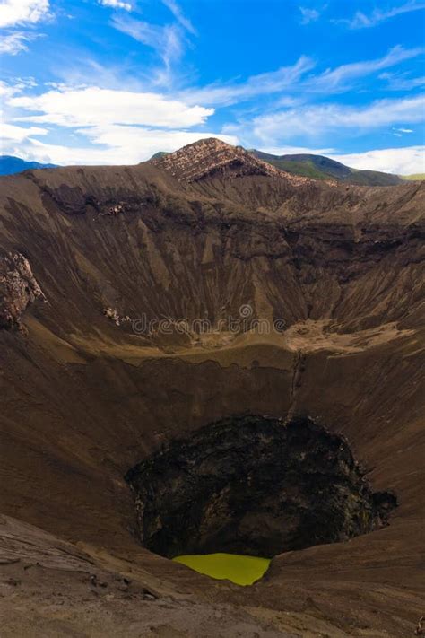 Crater of Bromo Volcano Against Blue Sky with Clouds. Bromo Teng Stock ...