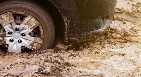 Vehicle Stuck In The Mud: Here Are 5 Ways To Get Your Vehicle Out Of The Mud | AAA Towing