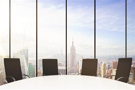 Premium Photo | White round conference table with chairs windows in floor and city view