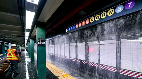 New York streets and subway floods after 127-year-old water main bursts ...