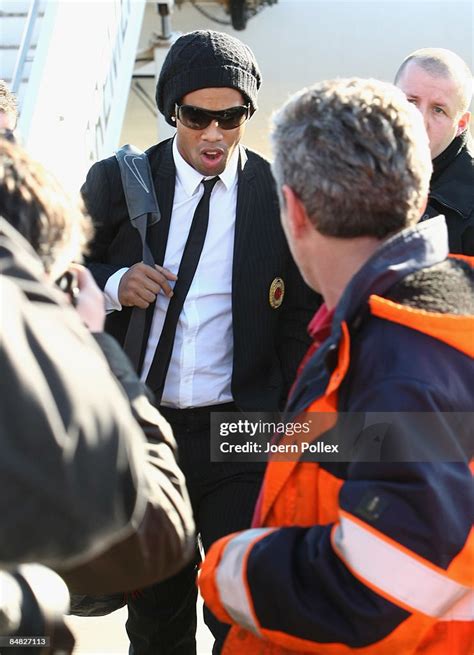 Ronaldinho of AC Milan arrives at Bremen Airport before their UEFA ...