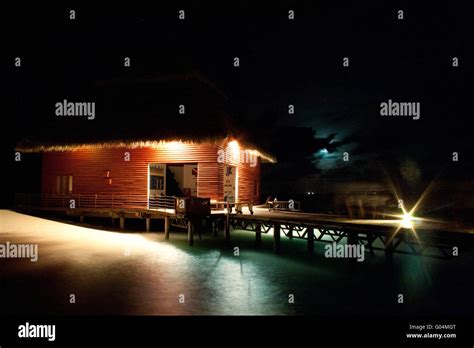 Maldives Bungalow Night Stock Photo - Alamy