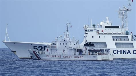 Tense face-off: Philippines confronts China over sea claims | AP News