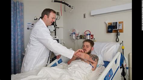 Wounded veteran receives double arm transplant - CNN