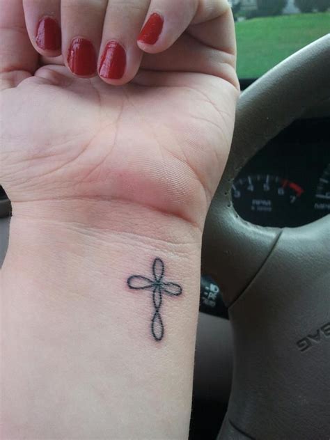 wrist cross tattoo. except centered | Tattoo maybe... | Pinterest