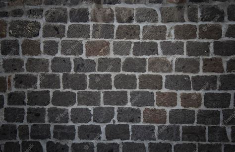 Premium Photo | Old stone wall as background