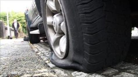 Dozens of car tyres in Plymouth are slashed - BBC News